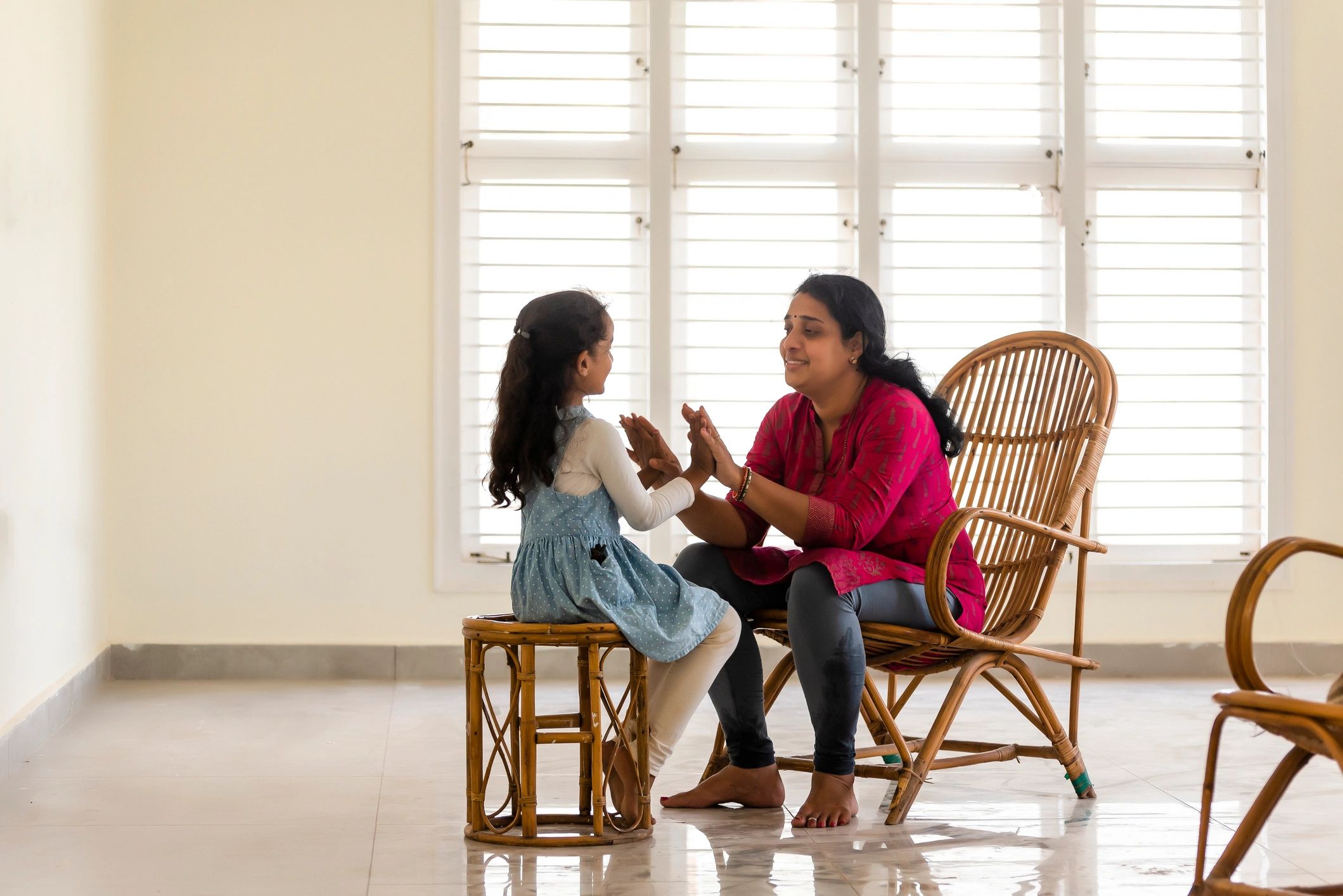 Parent and child enjoying music practice together